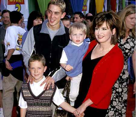 Michael Bryan Blosil along with his siblings and mother
